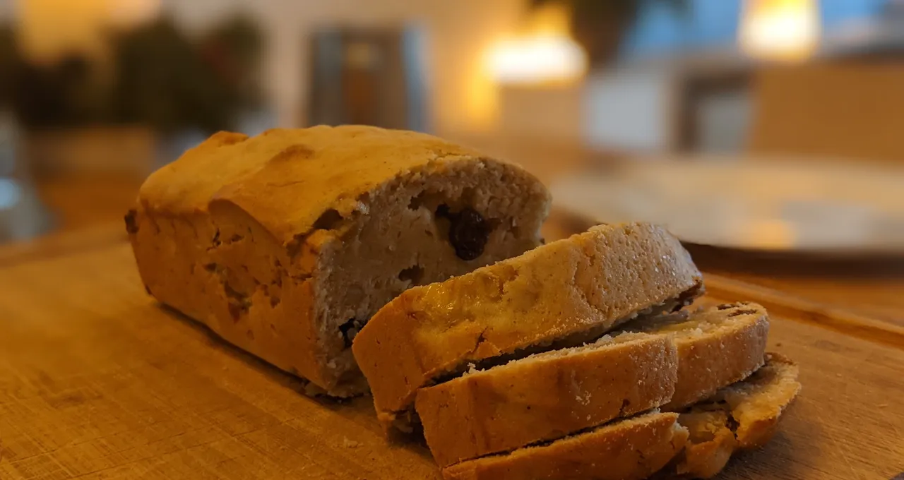Sliced banana bread on a wooden board